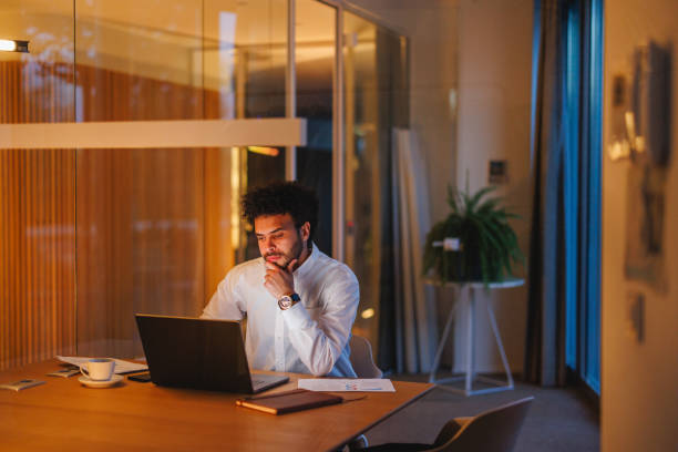 istock Focused Middle Eastern Businessman Working Late in Office 2191983499