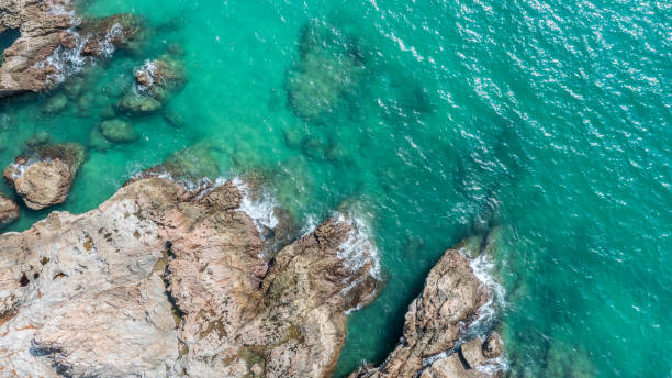 istock Rocky coastline cliffs, sea water surface aerial view with copy space. 2191987701