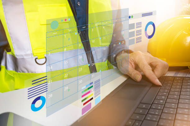 istock Engineers prepare work schedules and structure plans, check lists of materials and working hours. 2191989064