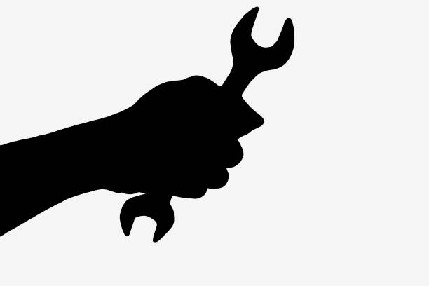 Silhouette of hand holding construction equipment on white background for use in various graphic works.