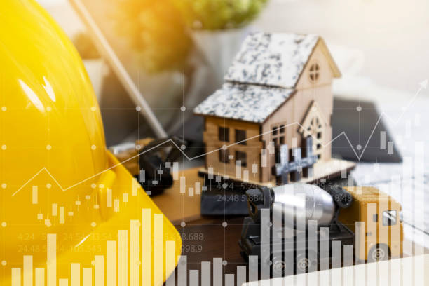 istock Engineers and architects work on residential building design, construction safety, construction business and real estate. 2191989222