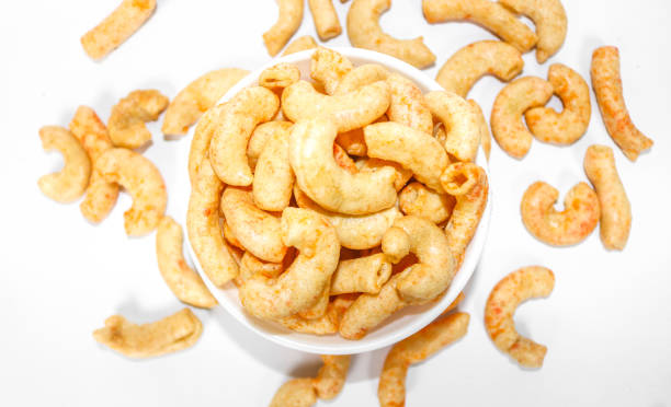 istock Fried macaroni served in a white bowl isolated on white background. Savory fried macaroni in Indonesia 2191989380