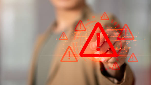 istock Programmer and virtual icons , exclamation mark ,alarm,computer virus detected ,danger warning concept or information error that should be urgently fixed and repaired ,Notification of security issues 2191993092