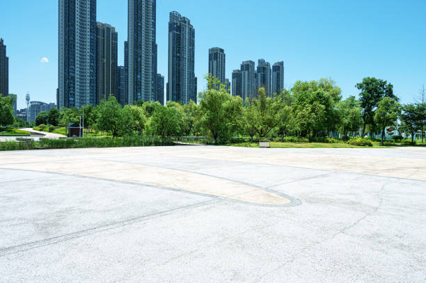 istock Empty square floor with modern urban skyline and sunny blue sky background 2191996411