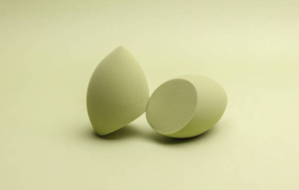 istock Eggs makeup sponges. Blenders for foundation on green background 2191996817