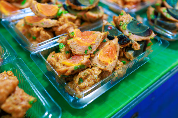 istock Top view of Fried Salted Egg Wrapped With Curried Fish Cake, focus selective 2192001700