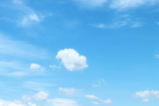 istock Focus on clouds. The sky was bright blue with pure white clouds like soft cotton.  Full frame shot. Clear sky blue sky background 2192004149