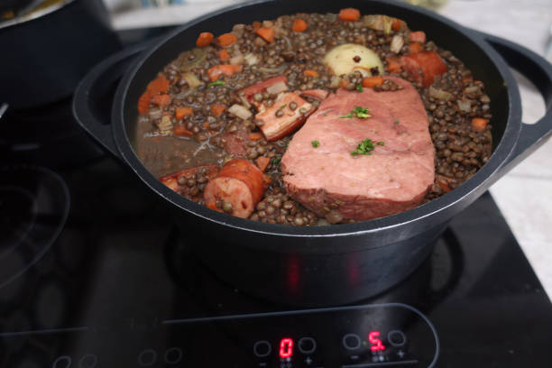 Lentils cooked with ham sausage and vegetables