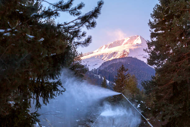 Bansko winter resort, Bulgaria panorama with ski slope run and snow cannons