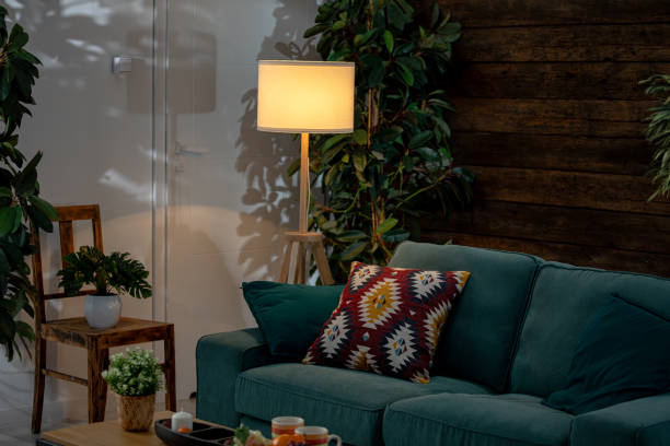 istock A Cozy Living Room featuring a Green Sofa accompanied by Stylish and Elegant Decor 2192006334