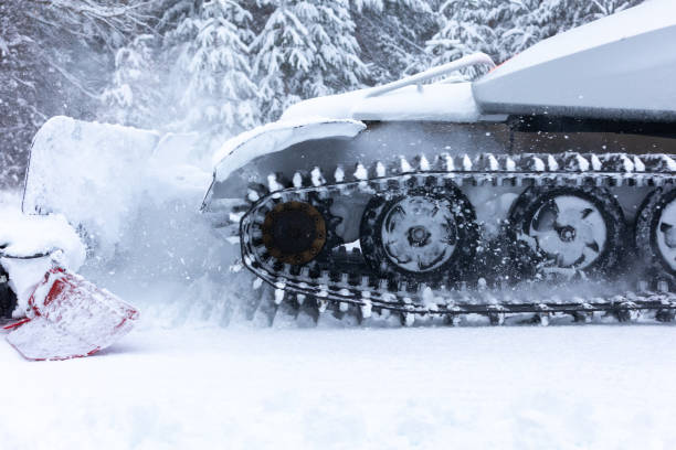 Bansko, Bulgaria snow groomer snowcat ratrack machine preparing ski slope close-up