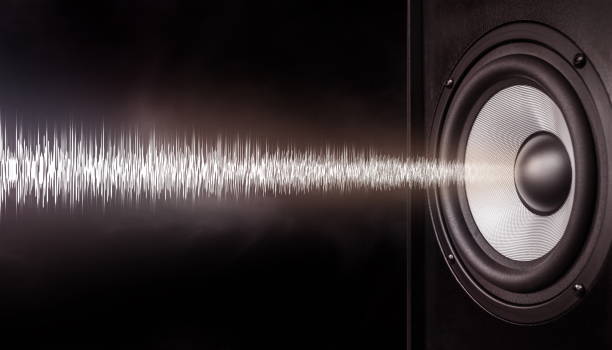 istock audio speaker and sound wave on dark background 2192008113