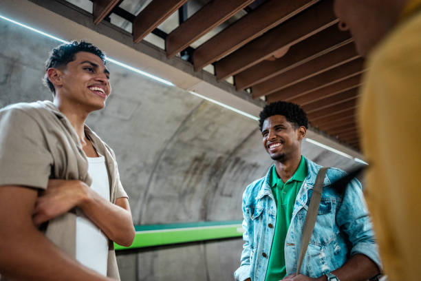 istock Young friends talking at the subway station 2192012649