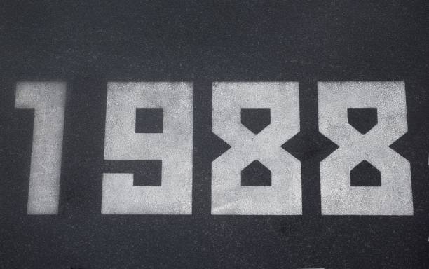 istock Black granite slab with white numbers 1988 on it 2192012814