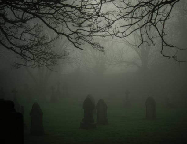 istock Eerie Graveard in thick fog and mist 2192015828