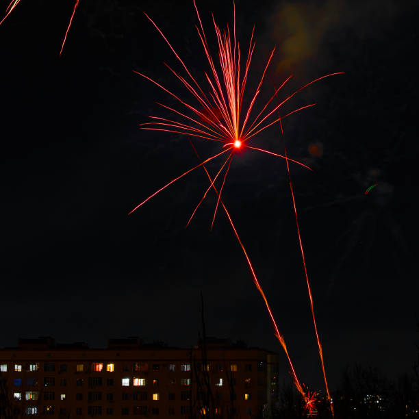 istock Festive fireworks in the form of two rays and a red star 2192015974