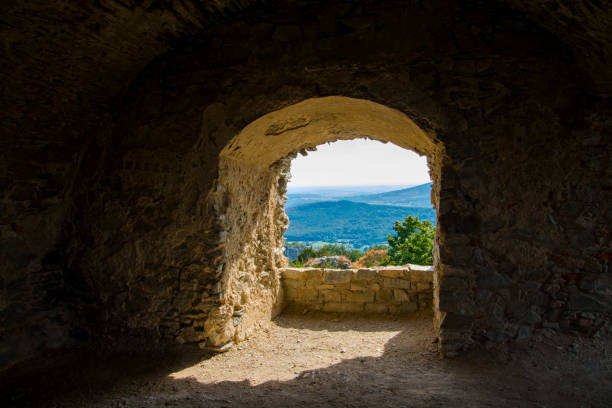 Stone window in the tower of the Castle of Gymes on the mount in Slovakia