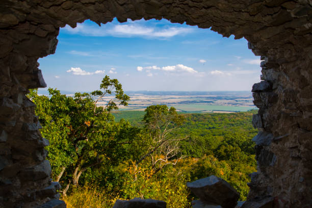 Stone window in the tower of the Castle of Gymes on the mount in Slovakia
