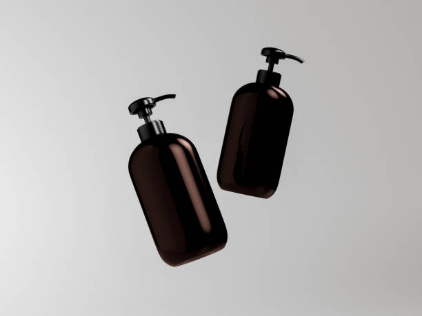 istock Pump bottles mockup, dark brown plastic dispenser bottles floating isolated on clean background, amber glass cylindrical cosmetic pump packaging, oval shape bottle, round liquid product container 2192017342