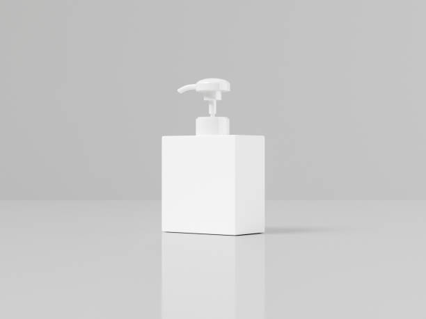 istock square Pump bottle mockup, short cubic shape liquid dispenser bottle, white plastic lotion container, rectangular shape liquid cosmetic dispenser display standing , personal care product mockup 2192017408