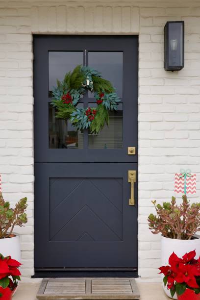 istock White brick cottage decorated for Christmas 2192020865