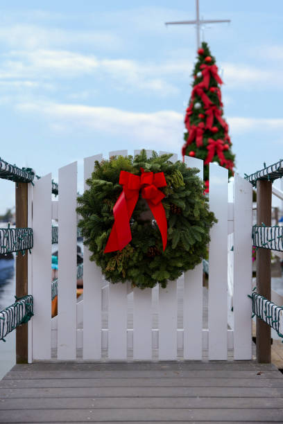 istock Boat dock gate decorated for Christmas 2192022544