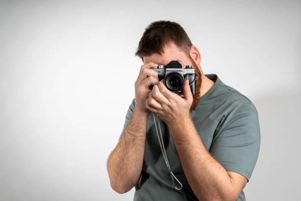 istock Man with taking pictures with camera 2192030547