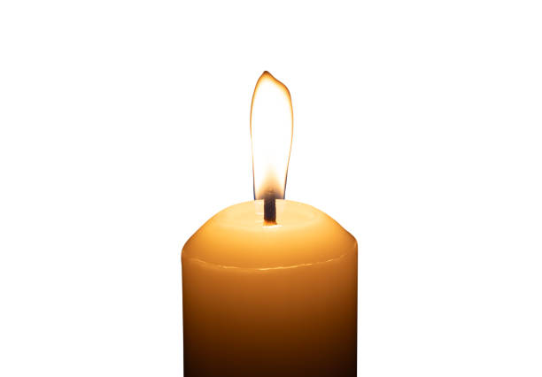 istock A single burning candle flame or light glowing on a big white candle isolated on white background with clipping path 2192034628