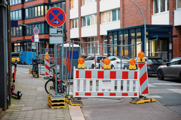 istock Road closed due to construction works in urban area 2192044526