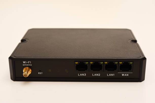 istock GSM modem. An Internet station with a SIM card. A black router on a white background. 2192045752