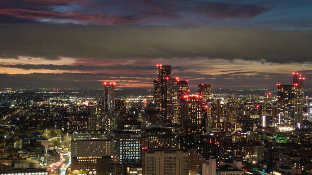 istock Manchester Night Cityscape with Illuminated Skyscrapers Under a Vibrant Evening Sky 2192047678
