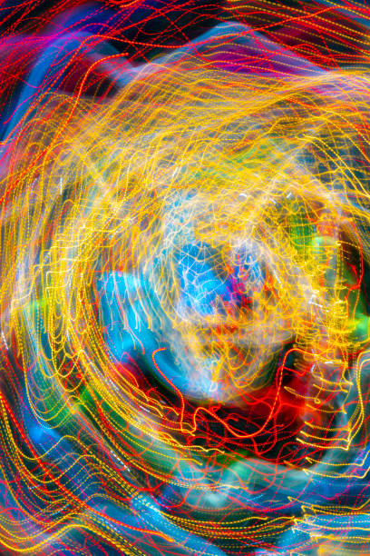 A pattern of glowing lines of light. Abstract design background.
