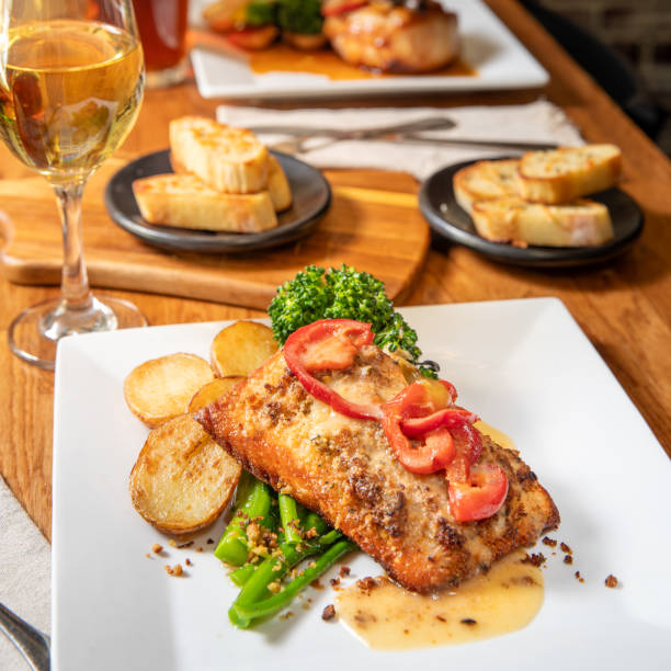 istock Grilled salmon over broccolini and potatoes 2192048529