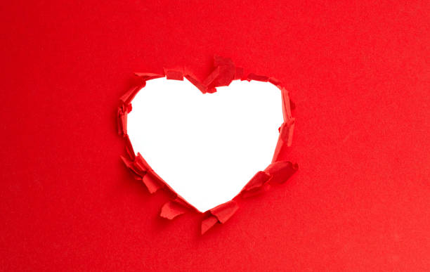 Tear open the paper into a heart-shaped shape