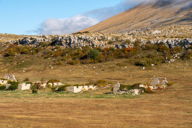 Old barracks ruins in karst landscape on Velebit mountain along the Master's Road Croatia.