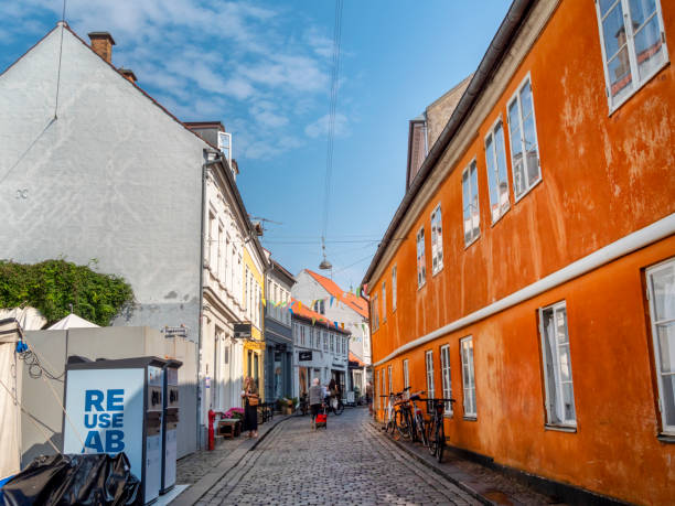 A quiet morning in Volden, a narrow, winding and pedestrianised street in central Aarhus, a port city in eastern Jutland, mainland Denmark. Volden is lined with boutiques and small shops and is in a very attractive old part of the city known as the Latin Quarter. ‘Volden’ means ‘the rampart’.
