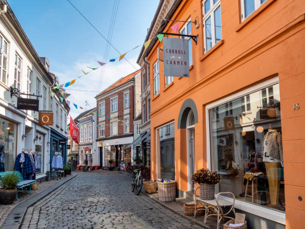 Volden, a narrow, winding and pedestrianised street in central Aarhus, a port city in eastern Jutland, mainland Denmark. Volden is lined with boutiques and small shops and is in a very attractive old part of the city known as the Latin Quarter. ‘Volden’ means ‘the rampart’.