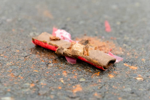 istock Discarded candy wrapper on pavement in urban area showing littering impact on environment during daytime 2192055034