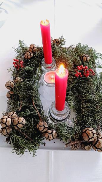 istock Christmas table decoration red candle 2192058904