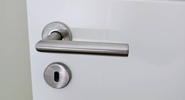 istock Metal door handle and keyhole. 2192061468