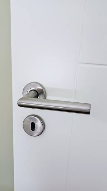 istock Metal door handle and keyhole. 2192061469