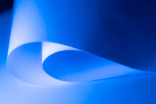 istock Colorful abstract curves in shades of blue tints and black creating a dynamic visual experience 2192066490