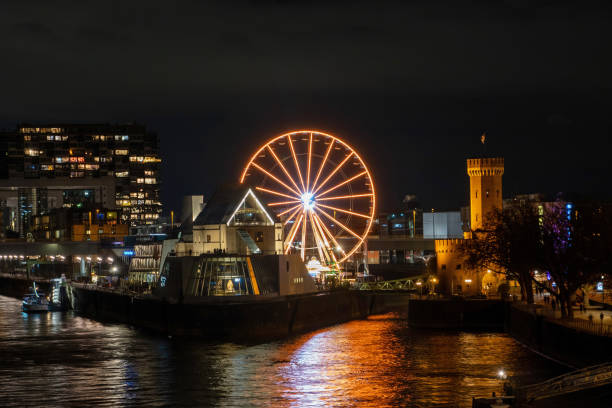 istock Rheinauhafen with illuminated Ferris Wheel in Cologne 2192068561