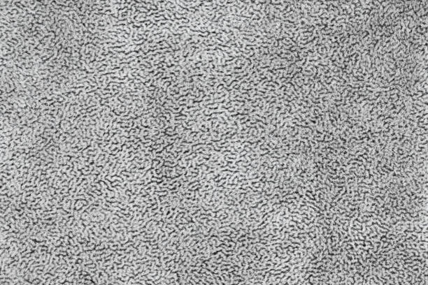 istock Gray fabric cloth with short haired fluffy abstract texture background. Photo silver colored textile 2192068622