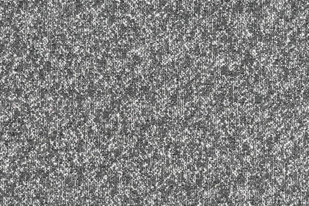 White and gray color of threads on cloth, hand woven abstract fabric pattern for background. Close-up photo of surface level textile material, background texture of fabric for design. Free copy space
