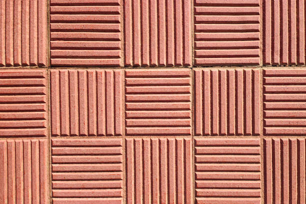 Background with abstract pattern of old and rough weathered kitchen tiles in close-up