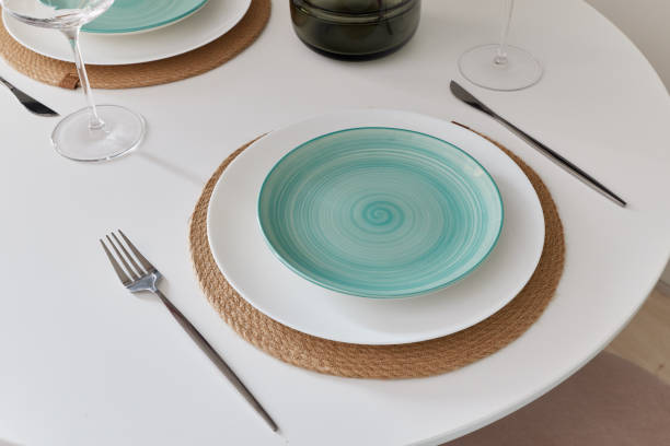 istock An Elegant Dining Setup Featuring Beautiful Mint Green Plates and Exquisite Glassware 2192070349