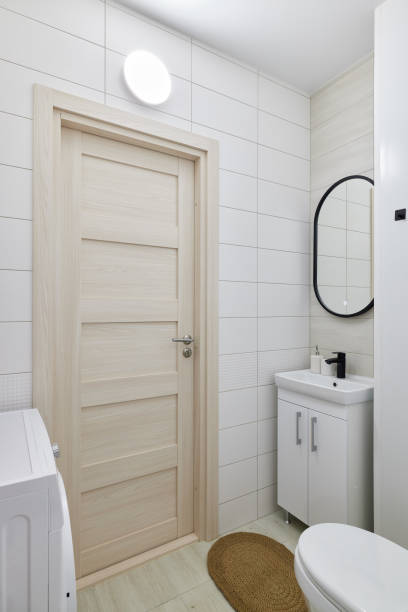 istock Explore a modern bathroom design that features elegant fixtures and maintains a clean aesthetic 2192071412