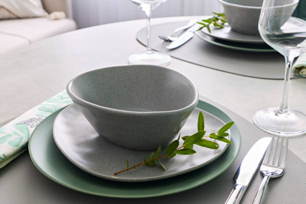 istock An Elegant Table Setting with Trendy Dishware, Beautiful Greenery, and Artful Touches 2192072436