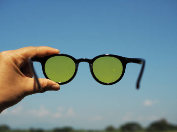 istock sunglasses with blue sky and color for seeing 2192073133